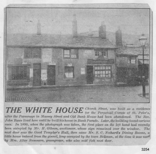 A black and white photo of a building with a bus in front

Description automatically generated with low confidence